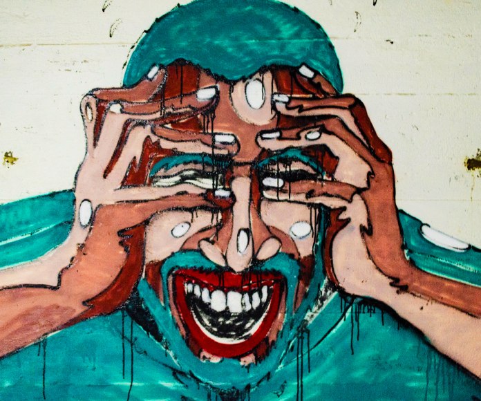 Mural de una persona estresada.