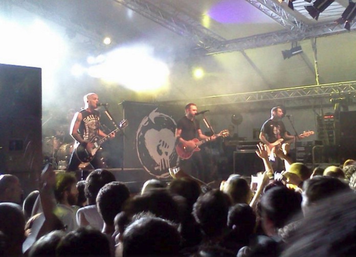 Movimiento punk. Rise Against en concierto. Italia, 2015.