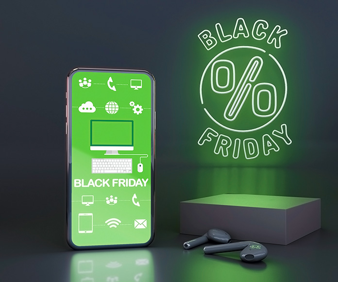 smartphone junto a un neón de Black Friday verde