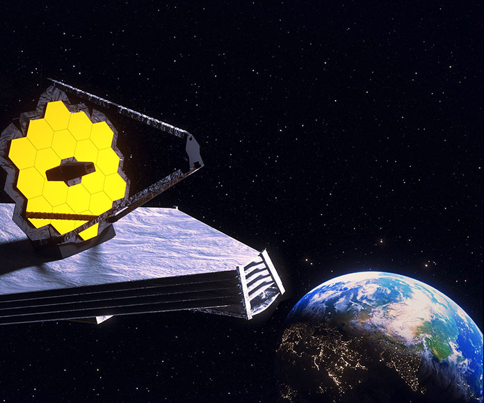 Telescopio espacial James Webb en el espacio con la Tierra al fondo