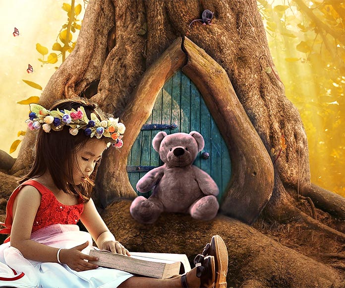 Imagen de fantasía de una niña sentada en el bosque leyendo