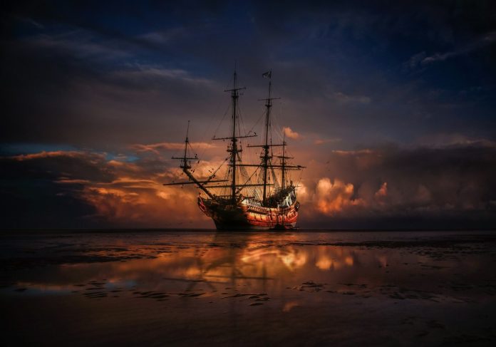 Historias de piratas, barco pirata, barco en el horizonte.