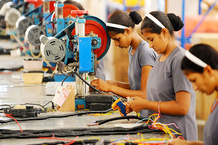 Trabajadores de maquinaria textil