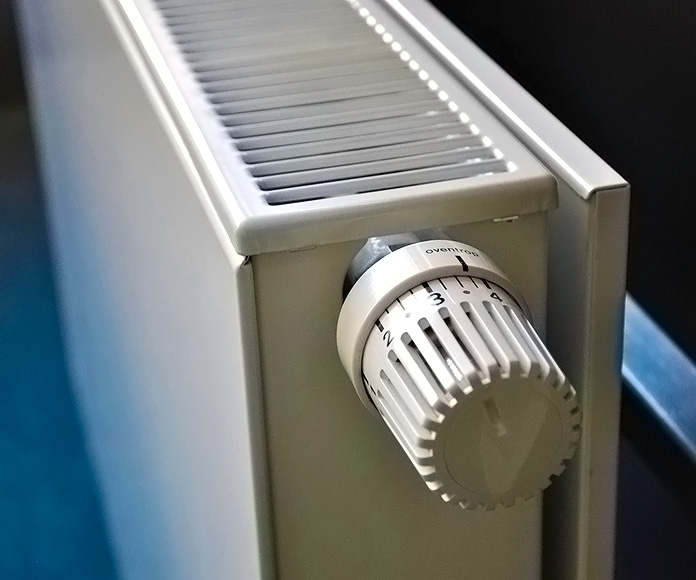 Radiador de pared con termostato manual